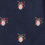 A Drum Bow Tie with a pattern of small drum kits with red drums and yellow cymbals is embroidered on a dark blue fabric background, adding a touch of standout elegance.