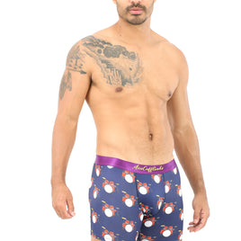 A man with a tattoo on his shoulder wears a pair of Drums Boxer briefs, featuring vibrant drum set patterns that move in perfect rhythm, providing ultimate comfort.
