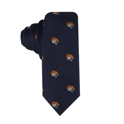 Introducing the Tiger Skinny Tie, a navy blue necktie adorned with small embroidered tiger head motifs, ideal for those who embrace bold fashion.