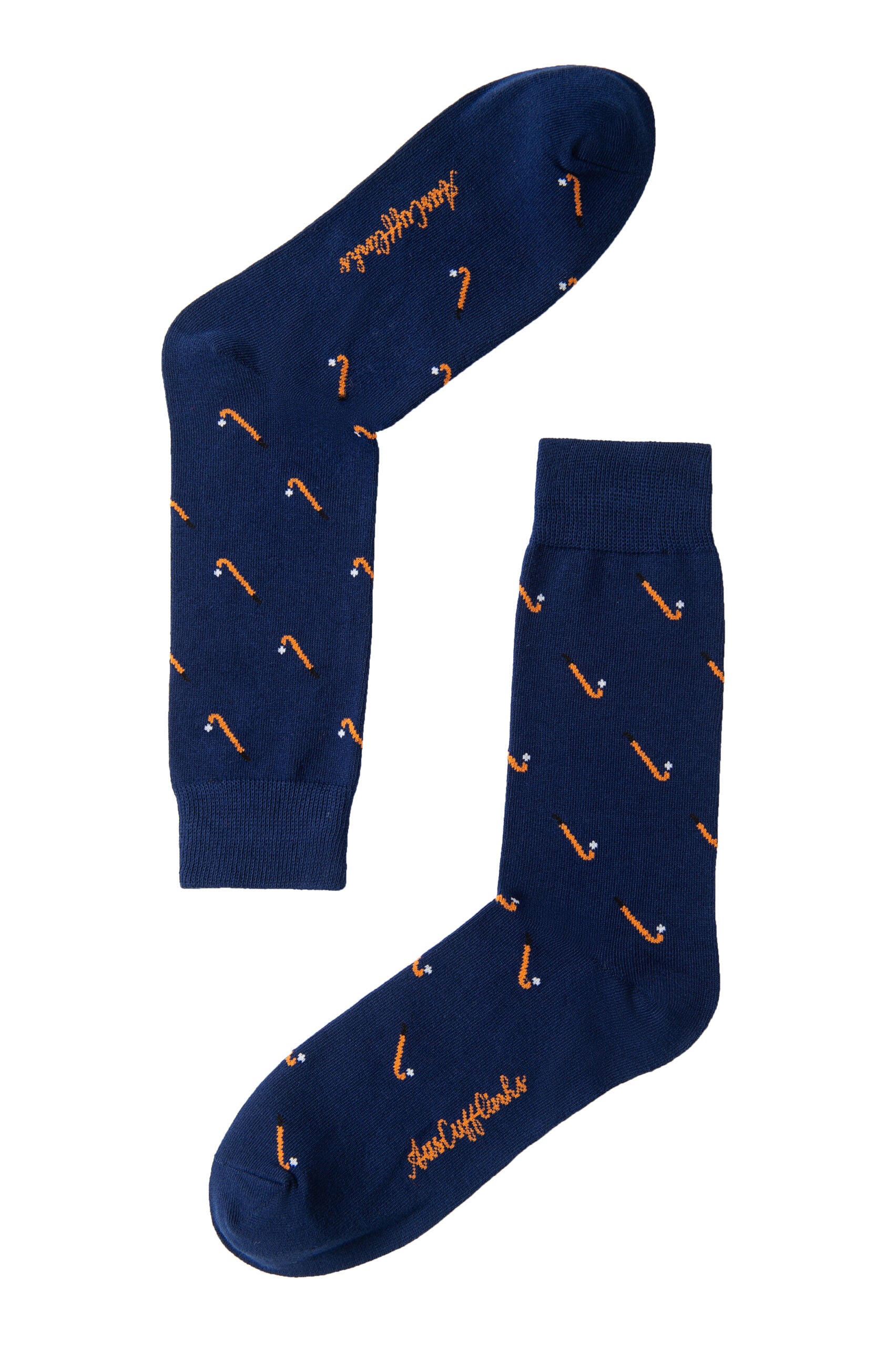 A pair of Field Hockey Socks with orange arrows on them.