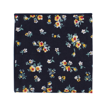 A navy floral pocket square adorned with small golden blossoms among yellow, white, and red flowers.