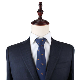 A mannequin dressed in a dark suit, white shirt, and an Fox Print Tie stands against a plain white background, subtly hinting at the wild allure of style.