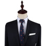 A sleek mannequin displaying a Fox Skinny Tie.