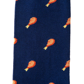 The Strawberry Cake Socks feature a delightful pattern of chicken drumsticks in vibrant orange and yellow on a blue background.