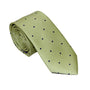 The Gold Navy Polka Dot Business Tie & Pocket Square Set features a rolled-up, light green necktie with small navy blue polka dots on a white background for an elegant touch.