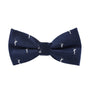 The Golf Swing Bow Tie, featuring a navy blue background adorned with small white golfer figures in various swinging poses, adds a touch of green style to your outfit.