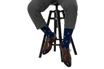 A man wearing a pair of Golf Swing Blue Socks.