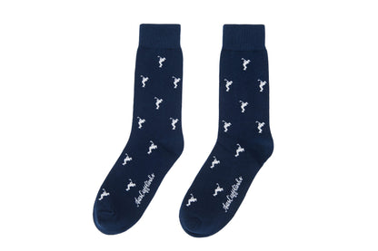 A pair of Golf Swing Socks with white deer designs.