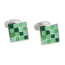 A pair of Coral Green cufflinks with a polished finish on a white background.