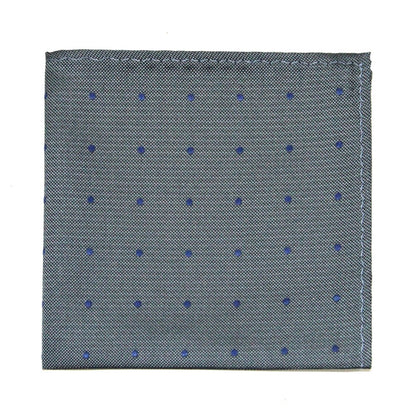 The Grey Navy Polka Dot Business Tie & Pocket Square Set, featuring a folded gray pocket square accented with small blue dots, pairs elegantly together.