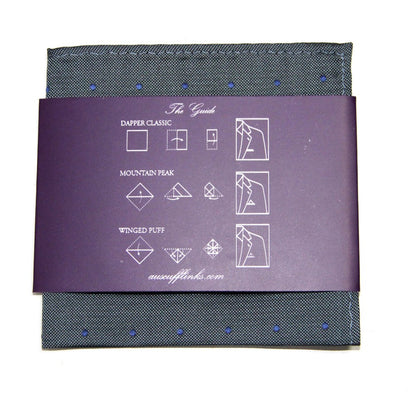 Explore the elegance of our Grey Navy Polka Dot Business Tie & Pocket Square Set, featuring a gray pocket square with blue dots and a purple guide for three folding styles: Dapper Classic, Mountain Peak, and Winged Puff. Perfectly complements any outfit for an exquisite look.