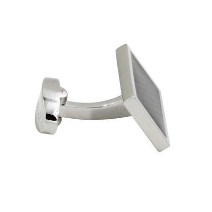 Carbon Fibre cufflinks on a white background with modern charm.