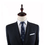A Headphone Slim Tie mannequin dummy dressed in a suit and tie exudes contemporary elegance.
