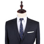 A dashing blue suit with a Horse Racing Slim Tie leads the way on a mannequin, exuding elegance.
