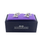 Displayed on a regal purple cushion, the silver Fighter Jet Cufflinks are perfect for aviation enthusiasts. Nestled in a sleek black box adorned with the "AusCufflinks" label, these themed cufflinks are sure to elevate any attire.