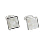 Meet the Light Ocean Mosaic Cufflinks, ideal for the modern gentleman. Featuring square, iridescent mother-of-pearl faces with a bold geometric pattern, these luxury cufflinks harmonize timeless elegance with contemporary style.