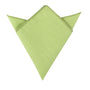 A lively lime green cotton pocket square elegantly folded into a playful triangle with two pointed corners at the top.