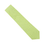 A Lime Green Cotton Skinny Tie lies on a simple white backdrop, infusing playful styles with a hint of spring.