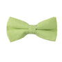 The Lime Green Cotton Bow Tie & Pocket Square Set features a classic design, ideal for spring weddings, and is showcased on a white background.