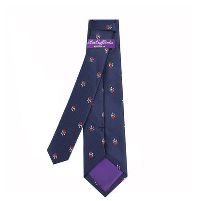 The Men's Bowling Tie, featuring a navy blue background adorned with small red and white circular patterns and displaying the "Italy inlands" label, perfectly harmonizes leisure and style.