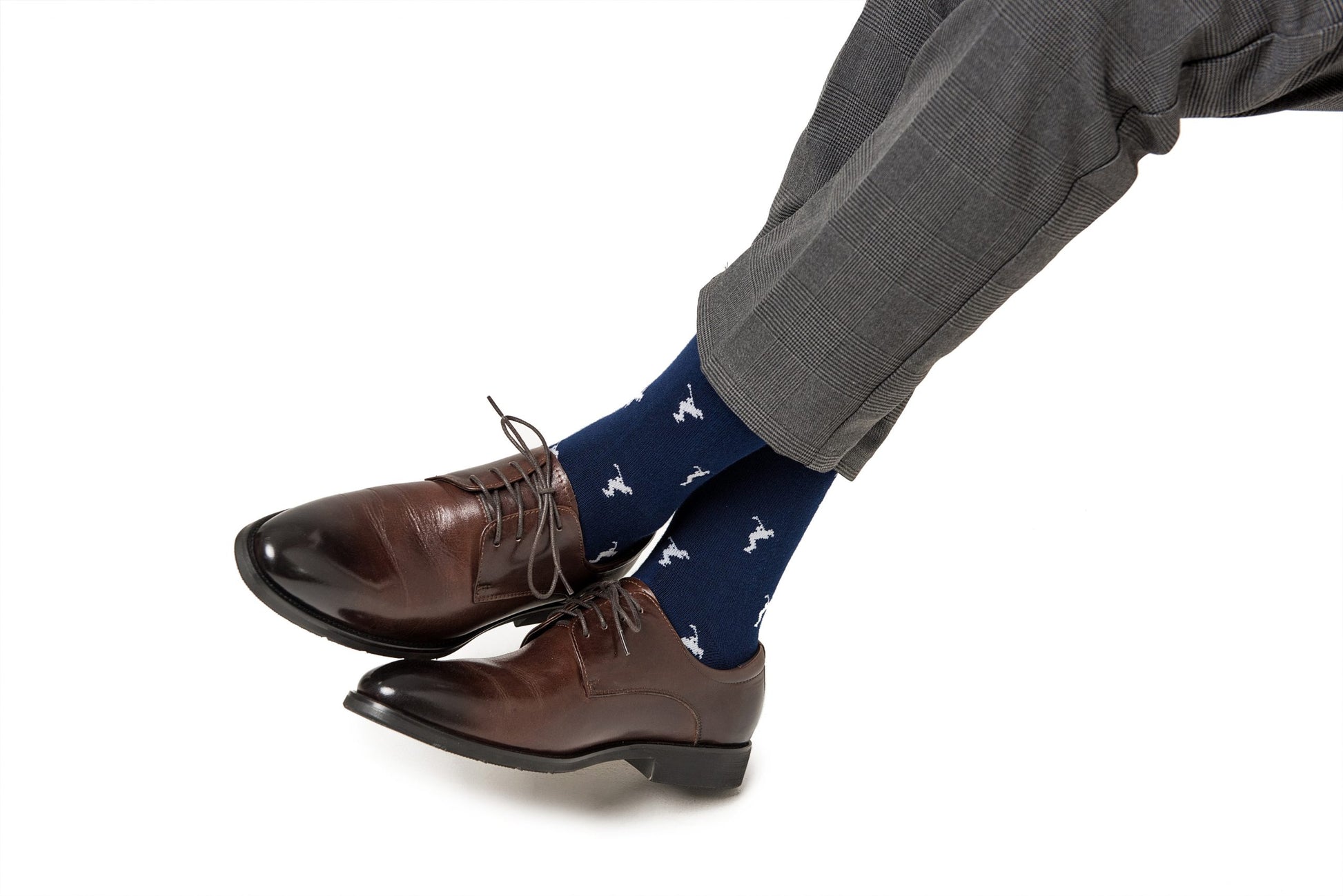 A pair of Golf Swing Socks on legs.