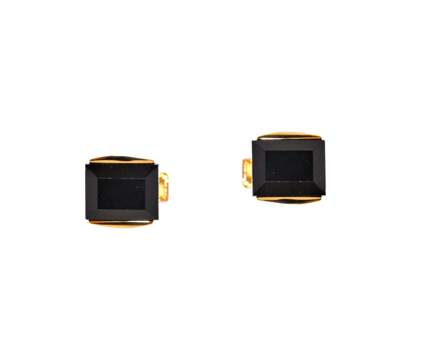 A set of black & gold clasp cufflinks exudes modern charm and elegance against a white background.
