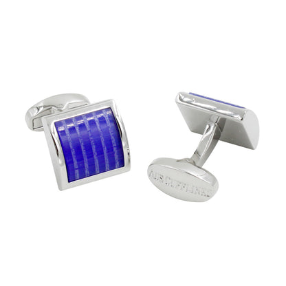 Two Midnight Purple Cufflinks are displayed: one upright to show the front and the other on its side, featuring the engraved manufacturer's name. Ideal for fashion-forward gentlemen seeking elegant luxury cufflinks.