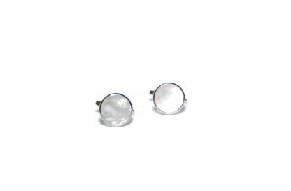 A pair of Mother of Pearl Silver Cufflinks with lustrous, reflective surfaces, displayed on a white background.