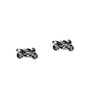 Enhance your style with these silver motorbike cufflinks, showcasing shiny details that catch the light against a sleek white backdrop.