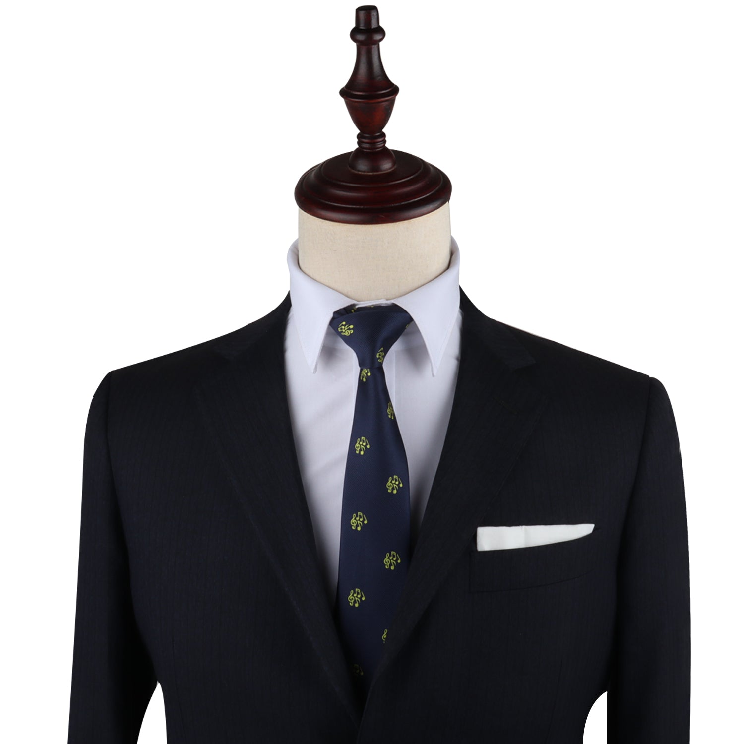 The mannequin presents an effortlessly harmonized look, dressed in a dark suit, white shirt, and the Music Note Necktie in patterned navy, complemented by a crisp white pocket square.