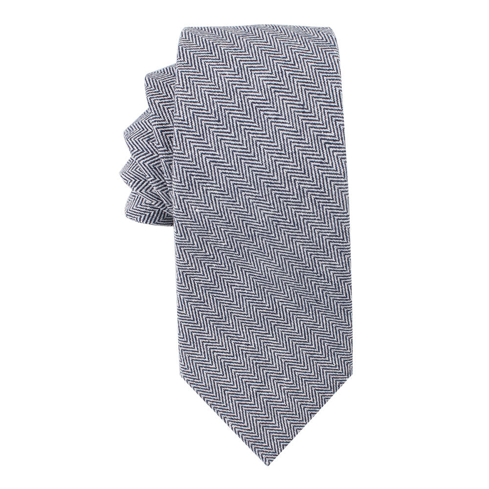 A neatly folded, Navy Blue Herringbone Business Cotton Tie exudes sophistication.