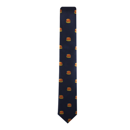 The Burger Skinny Tie in navy blue, featuring a repeating pattern of small cheeseburger images, makes a bold style statement by celebrating universally adored culinary favorites.