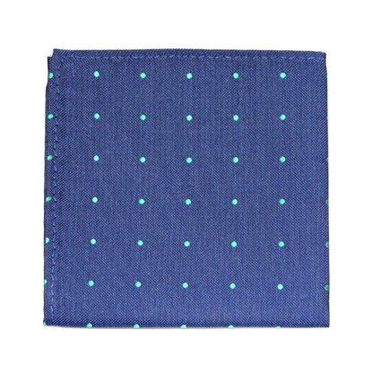 The Navy Green Polka Dot Business Tie & Pocket Square Set includes a blue pocket square with green polka dots, ideal for complementing the modern gentleman’s look. Its neat square fold pairs effortlessly with the tie, offering a refined touch to your attire.