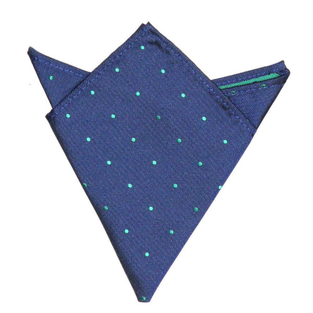 The Navy Green Polka Dot Business Tie & Pocket Square Set features a folded blue pocket square with green polka dots on a white background, ideal for the Modern Gentleman.