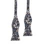 The Navy Multi Floral Self Tie Bow Tie features an elegant navy background with white, orange, and blue flowers—a perfect choice for weddings.