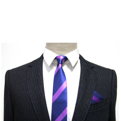 A mannequin displays a pinstripe suit with a white shirt, a purple-striped tie, and is stylishly accented with the Navy Purple Stripe Pocket Square.
