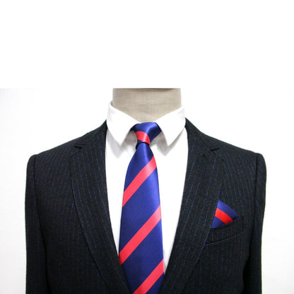 A navy pinstripe suit with a white shirt and the Navy Reddish Pink Stripe Business Tie & Pocket Square Set exudes modern gentleman charm on the mannequin.