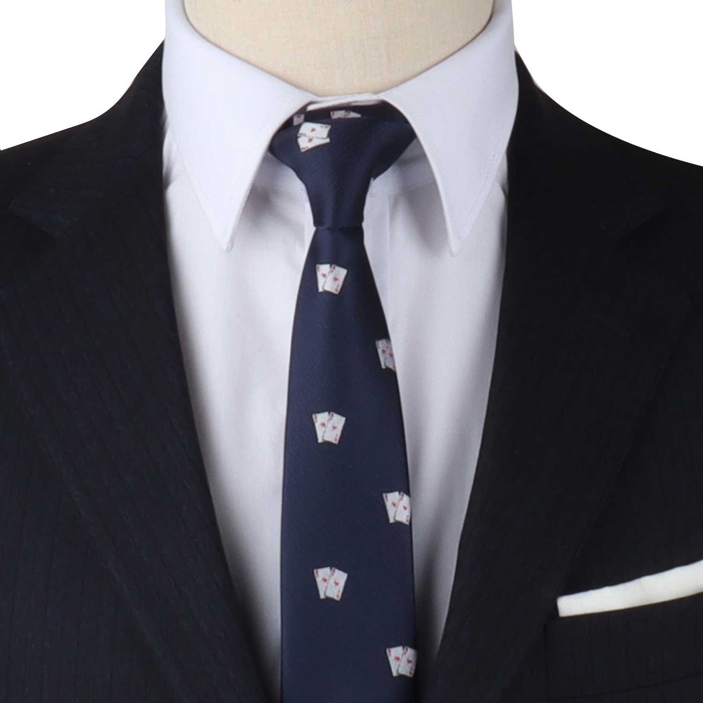 Close-up of a person in a black suit, white dress shirt, and the Novelty Poker Tie with small white designs. A white pocket square is visible in the jacket's breast pocket, ready to elevate your style.