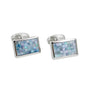 A pair of Ocean Blue Mosaic Cufflinks with a silver frame and a mosaic design in shades of blue and gray, exuding sophistication.