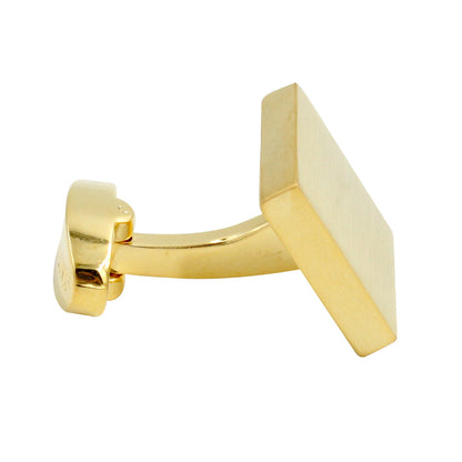 An Opulent Gold Cufflinks with a smooth, flat surface and a hinged back exudes an extravagant style, enhanced by its golden touch.