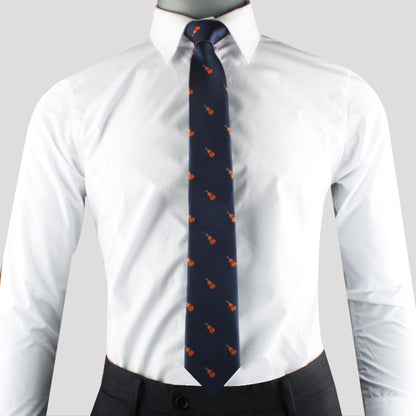 A fashion tribute adorned with a Orchestra Tie and shirt.