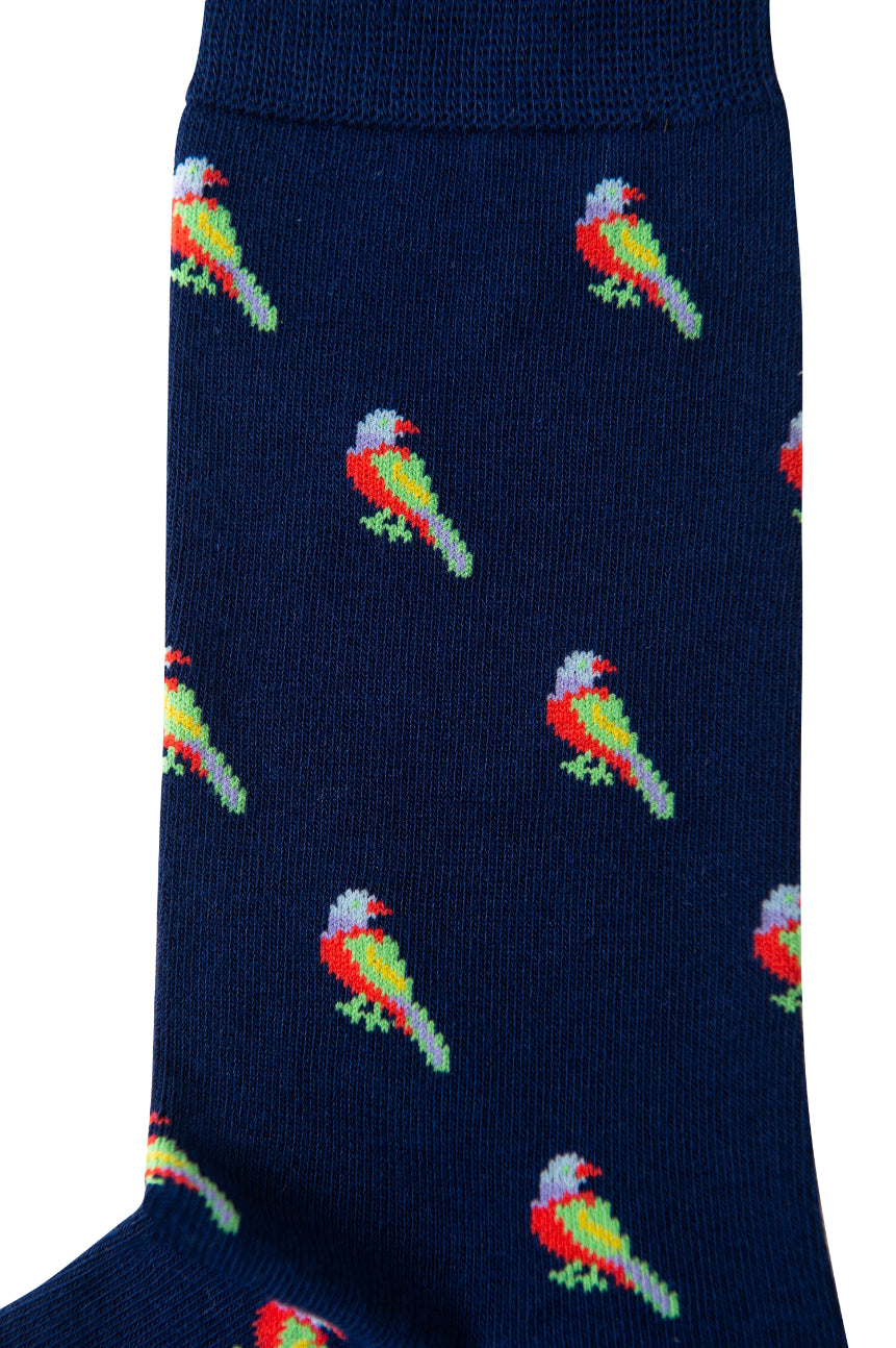 Introducing the Parrot Socks: These navy blue socks are embellished with a tropical motif, showcasing a vibrant parrot pattern that repeats throughout for a touch of whimsy.