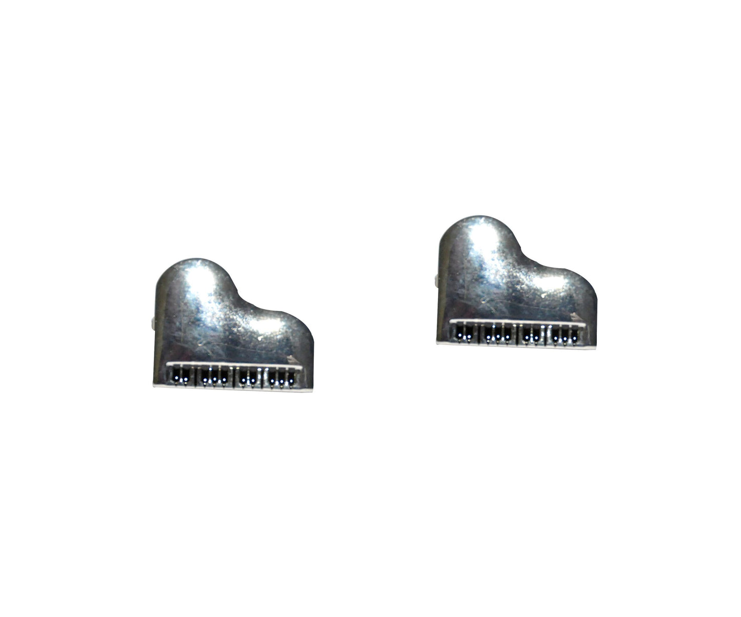 Two small, metallic Piano Music Cufflinks create a style symphony on a white background.