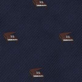 Close-up of the Piano Bow Tie, showcasing a classic style look with its navy blue fabric and repeating embroidered grand pianos pattern.