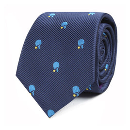 A rolled-up blue Pickle Ball Skinny Tie featuring a refined charm with small blue and yellow table tennis paddles and balls pattern, celebrating the energetic sport.