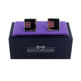 The Pink Diamonte Cufflinks, featuring premium craftsmanship, are elegantly displayed on a purple cushion atop a black box labeled "AusCufflinks.