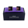 The Pink Diamonte Cufflinks, featuring premium craftsmanship, are elegantly displayed on a purple cushion atop a black box labeled "AusCufflinks.