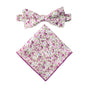 The Pink Roses Floral Cotton Bow Tie & Pocket Square Set, featuring a charming design of pink roses and green leaves on a pristine white background.