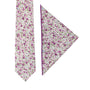 The Pink Roses Floral Cotton Skinny Tie and Pocket Square Set exudes perennial charm with its purple and pink flower design, featuring blush blooms on a white background.