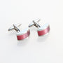 A pair of Pink Stone Cufflinks with a curved, rectangular pink inlay, exuding a touch of rosy elegance.